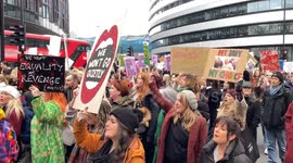 Hundreds of women take part in UK Women's March through central London in solidarity with all oppressed women around the world