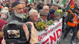 MPs JOHN McDONNELL and JEREMY CORBYN join the march at the National Demonstration for Palestine in central London