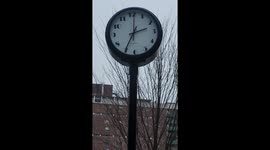 Funky Clock Rotates Face Instead of Hands