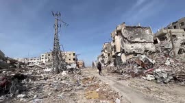 Internally displaced Palestinians inspect their destroyed homes in city of Rafah