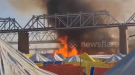 Fire rips through tents at bathing festival in India