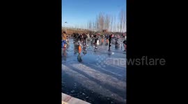 Ice Fishing Turns Chaotic: Anglers Plunge into Freezing Water as Ice Cracks in Hebei, China