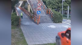 Delivery rider narrowly escapes death when jeep crashes into bridge staircase
