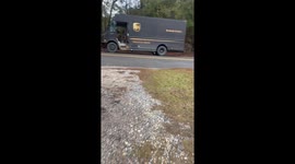 UPS driver gives viewers a look at truck after a turkey busted the windshield out