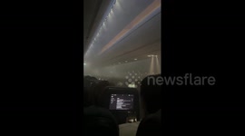 Plane makes emergency landing in Boston when cabin fills with smoke