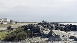 Some of the residential buildings that overlook a stretch of coast in the area where Royal Caribbean plans to build Italy’s first large privately-run marina in Fiumicino, near Rome.