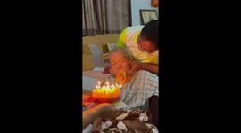Family try to surprise grandfather, 86, with birthday cake but he's too sleepy