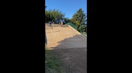 Girl Wipes Out on BMX Course