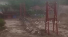 Flash floods kill at least two residents in Indonesia