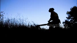 National Guard hacks down bushes to prevent wildfires in California
