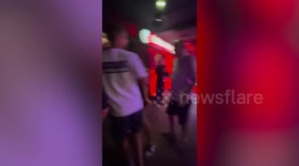 Half-naked sex workers flee as fire rips through strip club complex in Bangkok