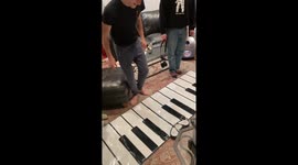 Musician Roommates Play Giant Floor Piano