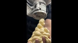 From dough to delight: Crafting chocolate donuts in China