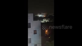 IDF forces surround a building in the village of Burqin