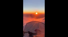 Snowmobiling through Changbai Mountains' sunset magic