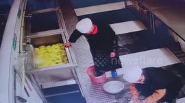 Outrage as school cafeteria worker is caught using his boots to mash the food