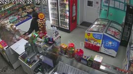 Masked thief falls over counter to steal vodka with toy gun before being caught drinking at home