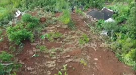 Indonesia landslide buries homes leaving two feared dead