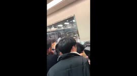 Shoppers go wild for freshly grilled chicken at supermarket in China