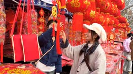 China: People Shop Spring Festival Ornaments in Fuyang