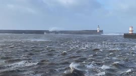 Gigantic waves breaching the west pier at Whitehaven, Cumberland