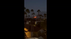 Fire fanned by strong winds erupts in San Diego, California