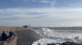 Storm Eowyn, huge waves batter the lighthouse in Porthcawl, Wales