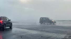 Firefighter nearly gets taken by the high speed of winds as this video compilation from Storm Eowyn as severe damaging winds causes masses of disruption across the British isles