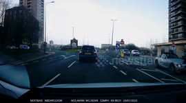 advertisement hoarding slams into car windshield and causes others to take evasive action