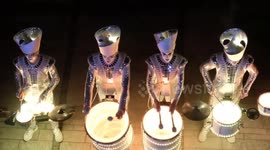 Neon drummers entertain visitors on first night of the Battersea Power Station Light Festival