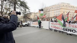 Israel-Hamas war: Protesters carry a banner reading ‘Remembrance Day, Genocide Out of History’ during Palestine Support Rally ahead of Remembrance Day in Rome.