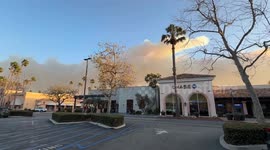 US: Smoke from wildfires billows behind Bank of America in Malibu