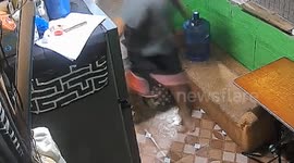 Resident has a near miss with a cobra when he quickly steps over snake