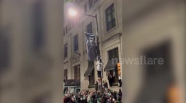 Eagles fan falls from flag pole during celebrations in Philadelphia
