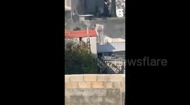 Israeli army bulldozers in the Jenin refugee camp