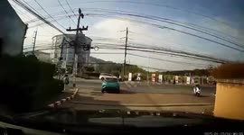 Motorcycle collision flings riders through the air at intersection