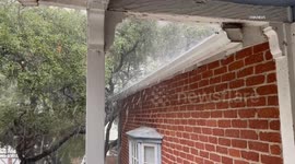 US, Los Angeles: Hollywood Hills Heavy Hail Sticks to Ground