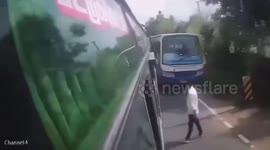 Jay walker somehow survives being crushed between two buses
