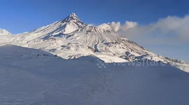 Bezymianny and Kamen volcanoes seen from helicopter in Russia