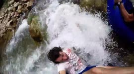 Man flips out of floating ring while tubing on river