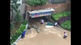 Underground garage full of cars completely flooded