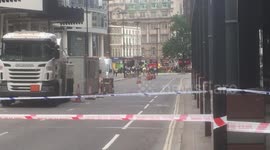 Police close London street due to suspicious package. 2