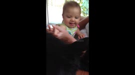 Ava Jean petting family cat!