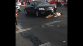 Woman pretending to be crashed happens to meet police