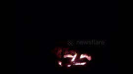 Drunk man dances in the fire