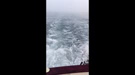 Navigating through Falmouth Bay on the boat in thick fog
