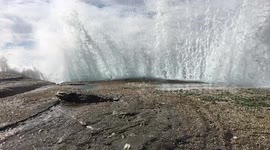 Stunning footage of waves crashing into rocks in slow motion