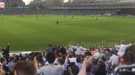 DUPLICATE Cricket fans at The Oval have a go at the Icelandic Viking Clap
