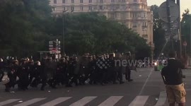 Riot police charge at football supporters in Paris
