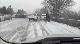 Chaos on Chinese highway as snowfall causes massive pile-up
